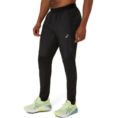 3. Spodnie Asics Road Pant M 2011D097001