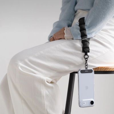 5. Smycz do telefonu Ringke Holder & Puffer Hand Strap - czarna