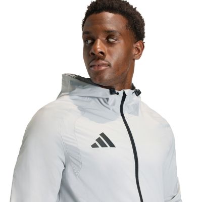 4. Kurtka męska adidas Tiro 26 Travel Windbreaker jasnoszara KD3336