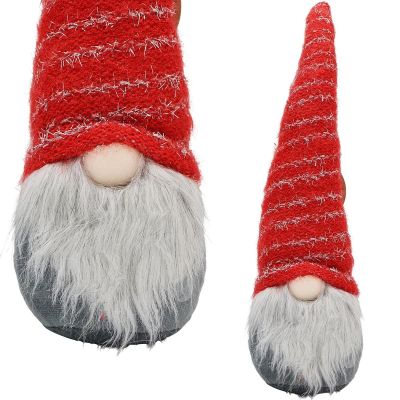 7. SKRZAT Z DŁUGĄ CZERWONĄ CZAPKĄ I ŚWIECĄCYM NOSEM 10x9x42CM