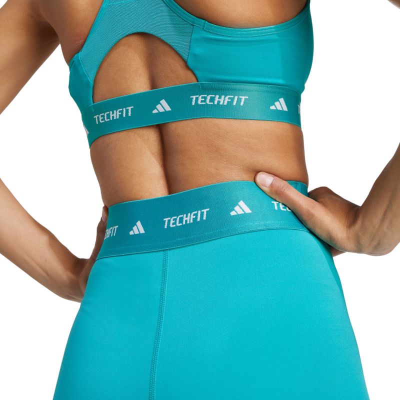 11. Spodenki damskie adidas Techfit turkusowe JW7561