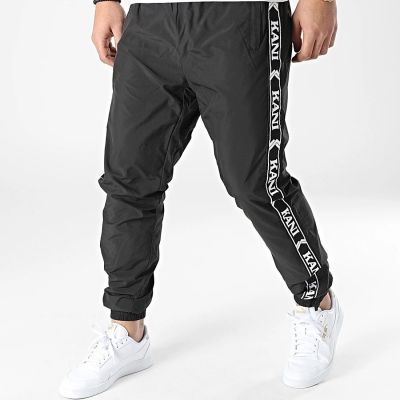 3. Spodnie Karl Kani Og Tape Trackpants M 6006127