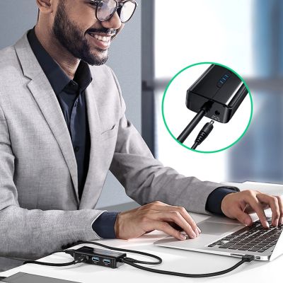 4. Adapter sieciowy Ugreen 20265 USB-A / RJ45 1000 Mbps HUB 3x USB 3.0 - czarny