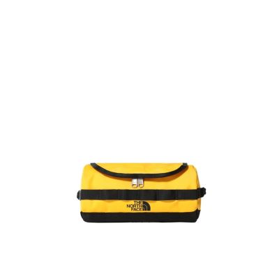 3. Kosmetyczka base camp travel canister summit gold-black The North Face