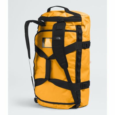 4. Torba base camp duffel m-summit gold-tnf black-npf THE NORTH FACE