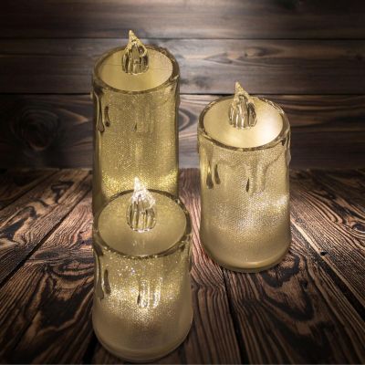 12. ŚWIECA DEKORACYJNA 8 CM TRANSPARENTA CIEPŁY BIAŁY 1 LED