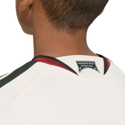 8. Koszulka dla dzieci adidas Manchester United 26/27 Third Jersey beżowa KC4770