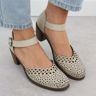 6. Skórzane sandały damskie na słupku beżowe Rieker 40902-60