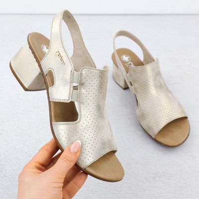 Sandały damskie na obcasie wsuwane złote Rieker 64665-60