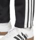 12. Spodnie adidas Essentials 3-Stripes Fleece M JD1854