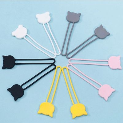 10. Silikonowy zwijacz kabla - brązowy