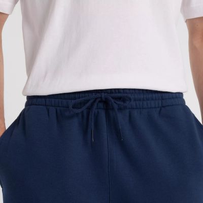 10. Spodnie New Balance Sport Graphic Fleece Jogger M MP51940NNY