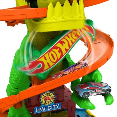 6. Hot Wheels City Zakręcony tor Remiza T-Rexa JBM73 MATTEL
