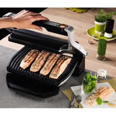 12. Grill Tefal OptiGrill GC712D34 (stołowy-zamknięty; 2000W; kolor inox)
