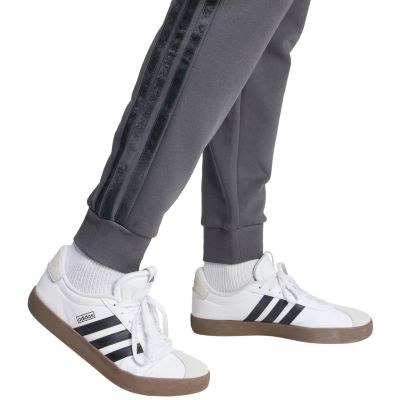 12. Spodnie męskie adidas AOP Colourblock szare JM1716