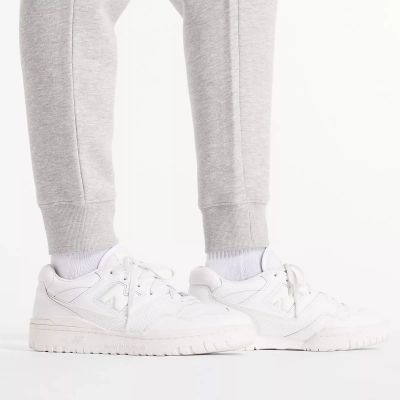 6. Spodnie New Balance Sport Fleece Jogger M MP43904AG