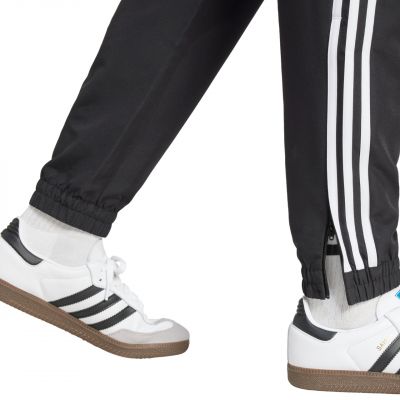 6. Spodnie adidas Tiro 25 Essentials Woven M JC5445