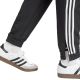 6. Spodnie adidas Tiro 25 Essentials Woven M JC5445