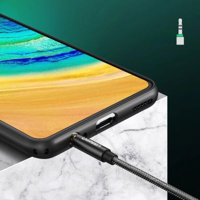 3. Kabel słuchawkowy Ugreen AV123 minijack 3.5 mm (męski) - 2x minijack 3.5mm (żeński) - czarny