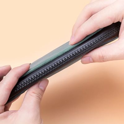 4. Saszetka rowerowa Rockbros 30990043006 na telefon, klucze, portfel 0.15 l - turkusowa