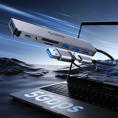5. Hub USB-A/USB-C Orico YSB4-U2 stacja dokująca 2x USB-A 2.0 + 1x USB-A 3.0 + 1x USB-C 2.0 + 1x USB-C - szary