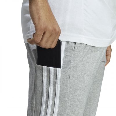 5. Spodnie adidas Essentials Single Jersey Tapered Open Hem 3-Stripes M IC0046