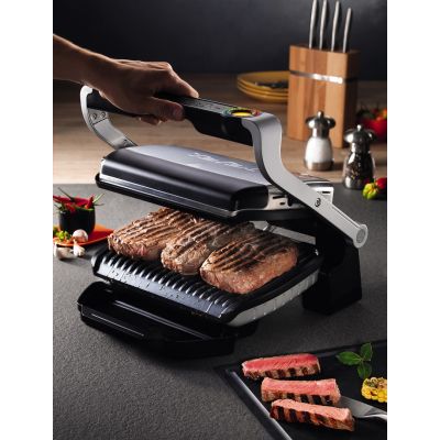 3. Grill Tefal OptiGrill GC712D34 (stołowy-zamknięty; 2000W; kolor inox)