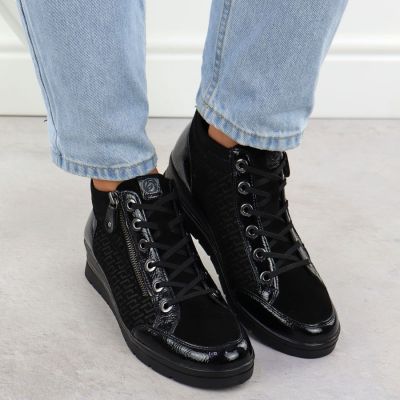 7. Skórzane botki na koturnie czarne Rieker Remonte R0773-05