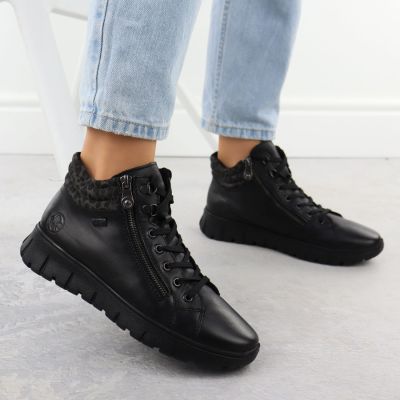 4. Skórzane wodoodporne botki damskie na podwyższeniu czarne Rieker N1305-00