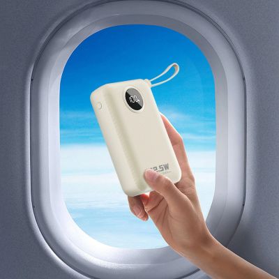 7. Powerbank Dudao K14+ 20000mAh 22.5W USB-C / USB-A / wbudowane kable Lightning i USB-C - biały