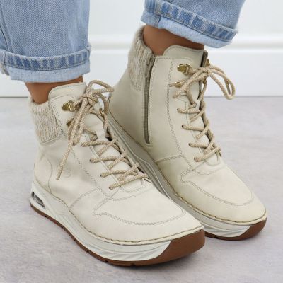 7. Botki damskie ocieplane trapery beżowe Rieker 44555-60