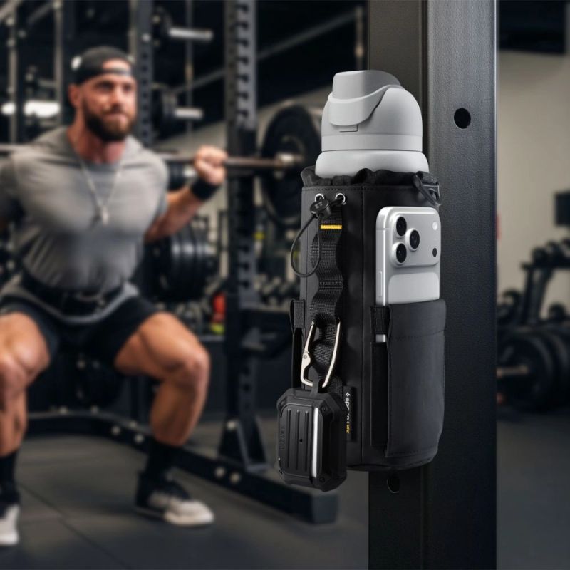 13. Torba Spigen Tumbler Holder Bag magnetyczna na butelkę wodę telefon klucze - czarna