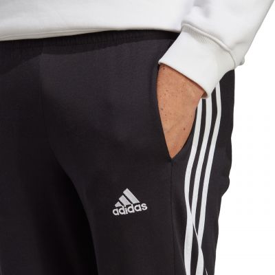6. Spodnie adidas Essentials Single Jersey Tapered Open Hem 3-Stripes M IC0044