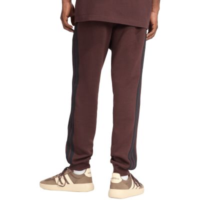 4. Spodnie adidas Essentials 3-Stripes Fleece M JX0749