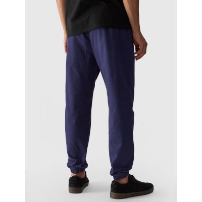 4. Spodnie casual joggery męskie 4F 4FWMM00TTROM0944-31S