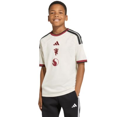 5. Koszulka dla dzieci adidas Manchester United 26/27 Third Jersey beżowa KC4770