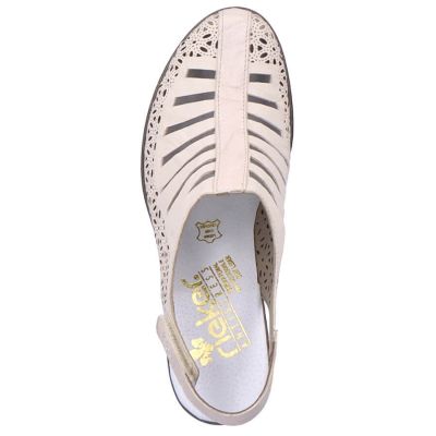 10. Skórzane sandały na obcasie Rieker W RKR49B beżowe