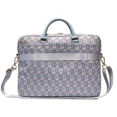 3. Torba Guess GCube Stripes na laptopa 16'' - niebieska
