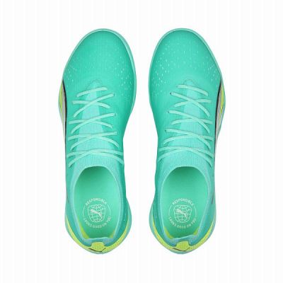 4. Buty piłkarskie Puma Ultra Ultimate Cage TT M 107210-03