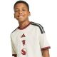 7. Koszulka dla dzieci adidas Manchester United 26/27 Third Jersey beżowa KC4770
