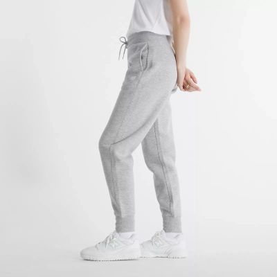 4. Spodnie New Balance Sport Fleece Jogger W WP43805AG