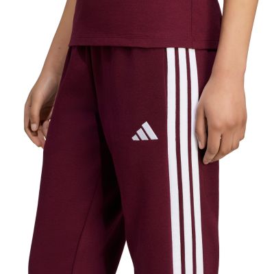 4. Spodnie damskie adidas Essentials 3-Stripes Fleece Slim bordowe KF8321