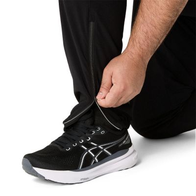 6. Spodnie Asics Core Woven Pant M 2011D224001