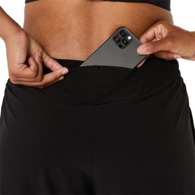 13. Spodnie Asics Core Woven Pant W 2012D176001