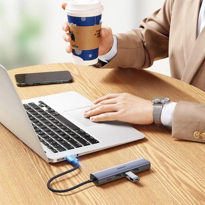 10. Ugreen wielofunkcyjny adapter HUB USB 3.0 - 3 x USB / Ethernet RJ-45 / USB Typ C PD szary (CM475)