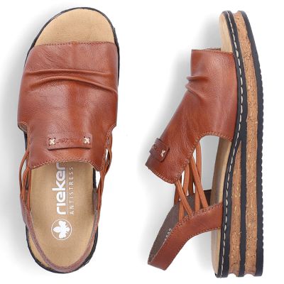 4. Komfortowe sandały damskie na koturnie brązowe Rieker  62962-22