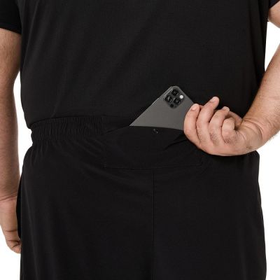 14. Spodnie Asics Core Woven Pant M 2011D224001