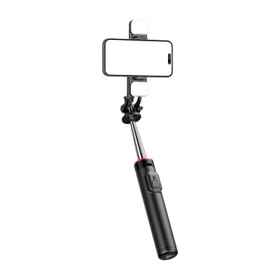 2. Selfie stick WC13YDS teleskopowy tripod 1.3m z podwójną lampą i uchwytem na telefon - czarny