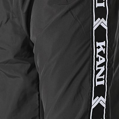 5. Spodnie Karl Kani Og Tape Trackpants M 6006127