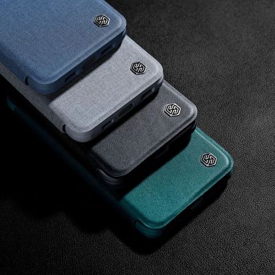 19. Nillkin Qin Cloth Pro Case etui do iPhone 14 Plus osłona na aparat kabura pokrowiec obudowa z klapką szary